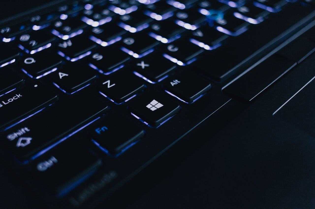 Mastering the First Impression: Your intriguing post title goes here Detailed view of an illuminated laptop keyboard showing individual keys and backlight effect.